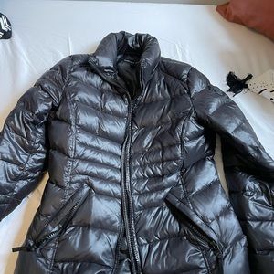 Women’s Andrew Marc black puffer jacket. Size medium.
